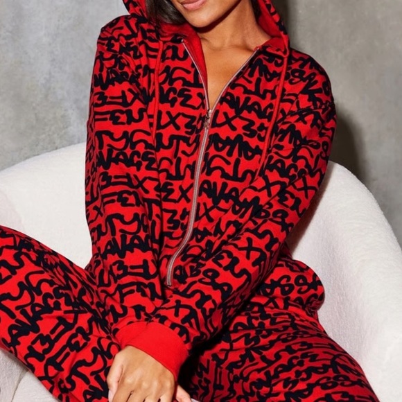 Savage X Fenty Pants - Savage X Fenty By RIHANNA HOODED ONESIE
Red Black Graphic Jumpsuit  Size 22-24
